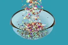 A bowl filled with various pills symbolizing a course of drug rehabilitation therapy